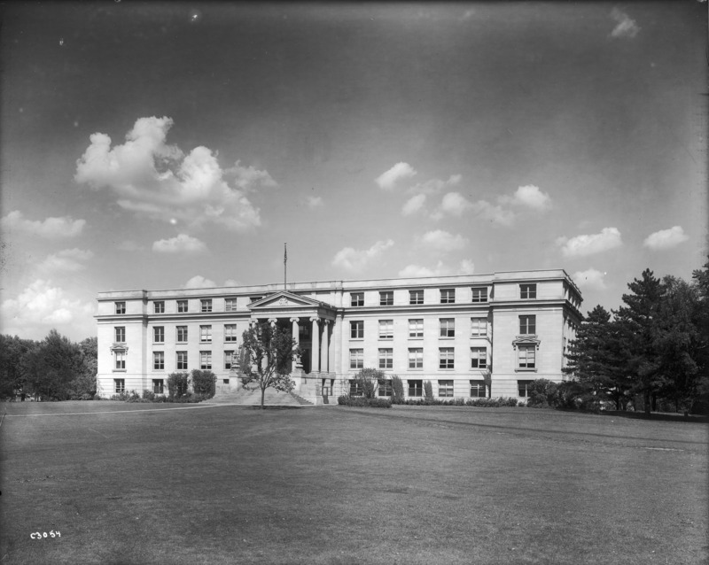 Agriculture Hall (Curtiss Hall) is viewed from the southwest, showing new plantings and trees around the building.