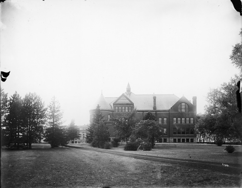 Marston Hall is partially obstructed from view in the background. The east side of Morrill Hall appears in the foreground.