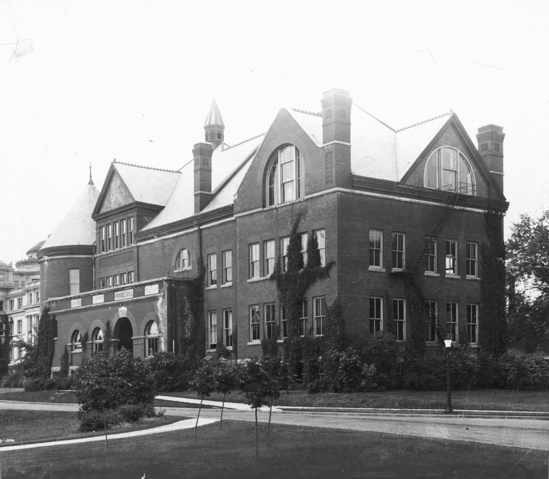 Central Building (Beardshear Hall) is only slightly visible to the far left of the front (east) side of Morrill Hall.