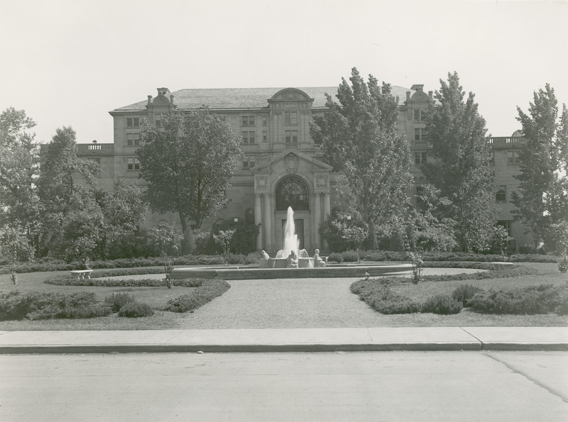 The Fountain of the Four Seasons by Christian Petersen is shown against a backdrop of the north facade of the Memorial Union.