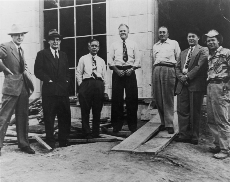 A photograph of the construction group involved in the 1952 northwest addition to the Memorial Union. Pictured are, left to right, Harold Pride, Elmer H. Borg, Frank Mack, Rudy Lubsen, Ernie Moschelle, Joe Borg, Elme Kluck.