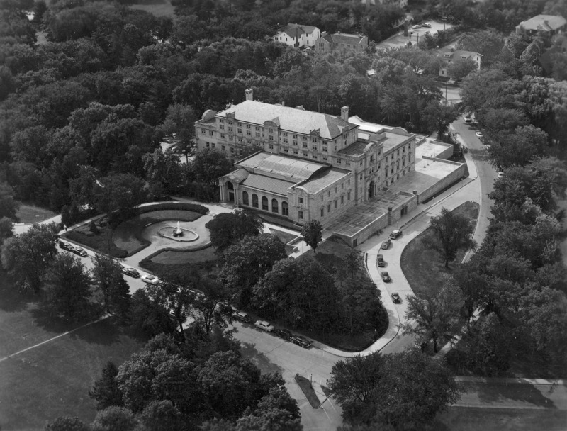 The Memorial Union, Fountain of the Four Seasons by Christian Petersen, the surrounding streets and landscaping are shown in the aerial view taken in 1954.