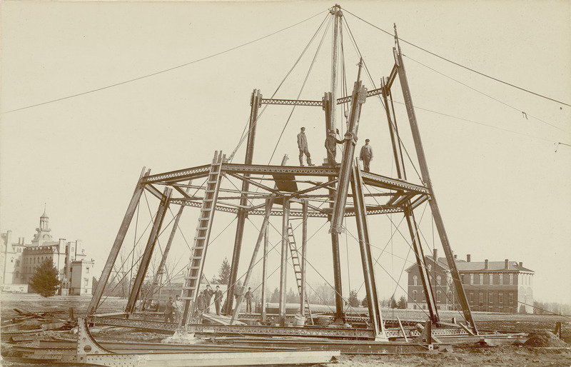 The Water Tower construction site, March 22, 1897, about 4:30 PM. Old Main and the Chemical and Physical Laboratory can be seen in the background.