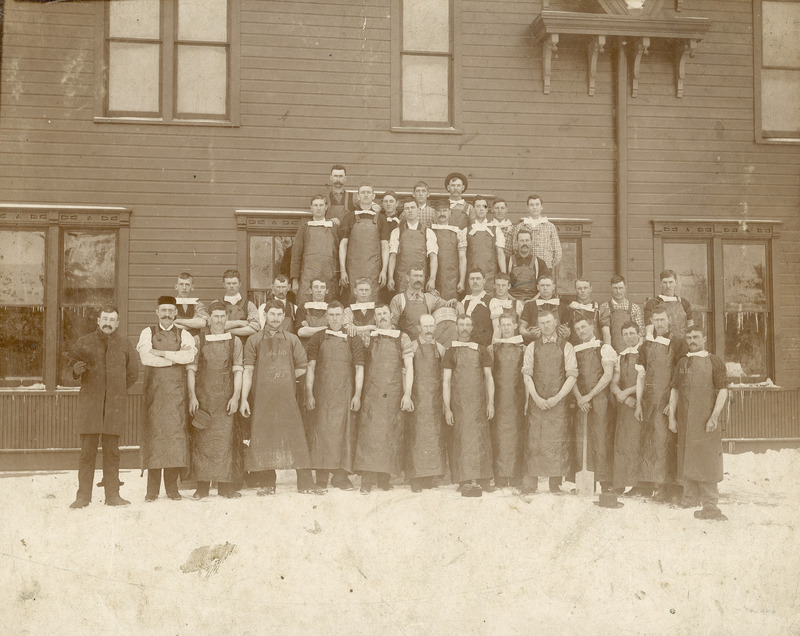 The 1893 Dairying class of 36 students and Professors F.A. Leighton and G.W. McKay standing in front of the creamery building. 