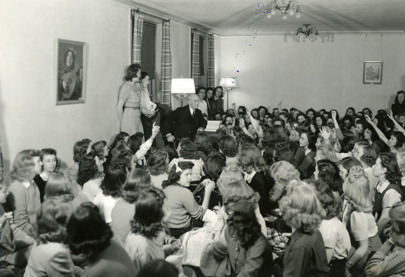 Charles Harvey Brown is leading a discussion group consisting mainly of young women students.