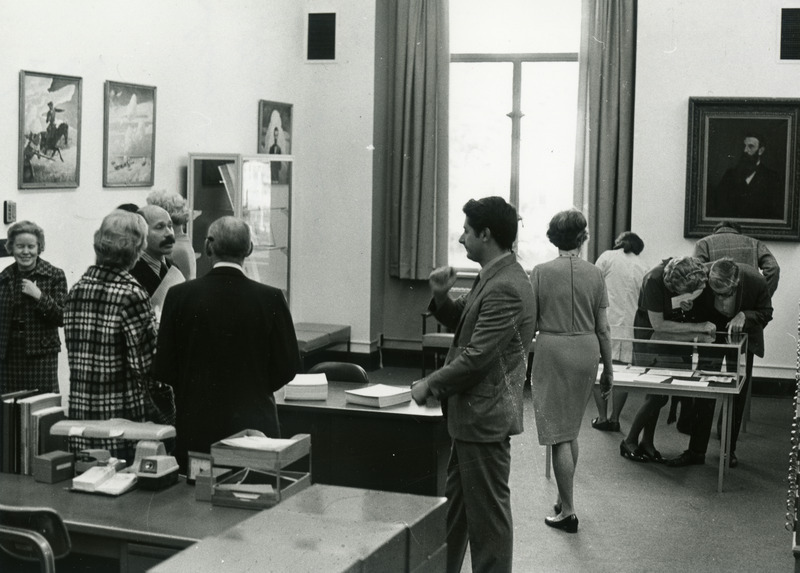 Dean Helen LeBaron Hiton, Stanley Yates, Jim Brown, and Mrs. Matterson are among other participants at this Special Collections open house.