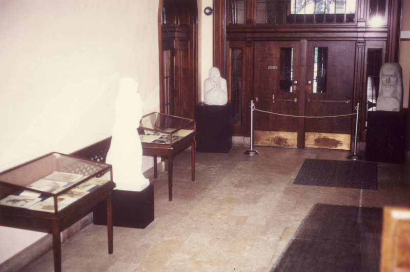 Three Christian Petersen sculptures and two display cases of materials are featured in the University Archives Christian Petersen exhibit held in 1972.