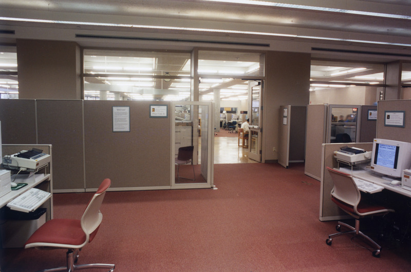 The reference area is shown in a view towards the glass wall on the south, before library renovation which took place in 1999.