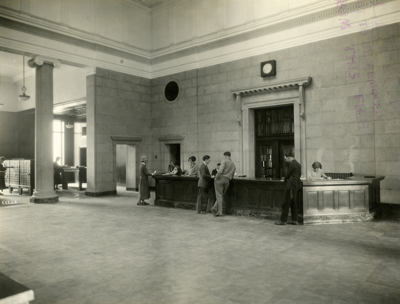 The Loan Desk (currently called Circulation Desk) is shown as it first appeared in the newly opened library.