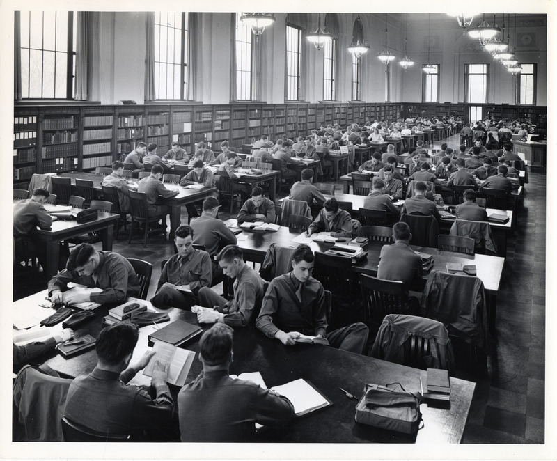 Many students wearing military uniforms study in the Main Reading Room (currently called the Periodical Room).