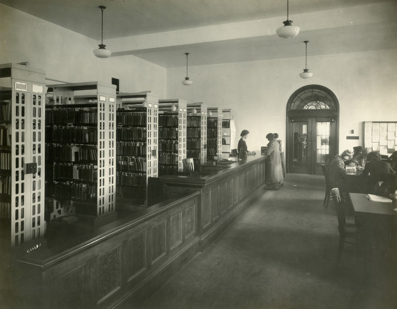 The reserve desk is shown in the Reserve Room (currently Room 198) in the newly opened library.