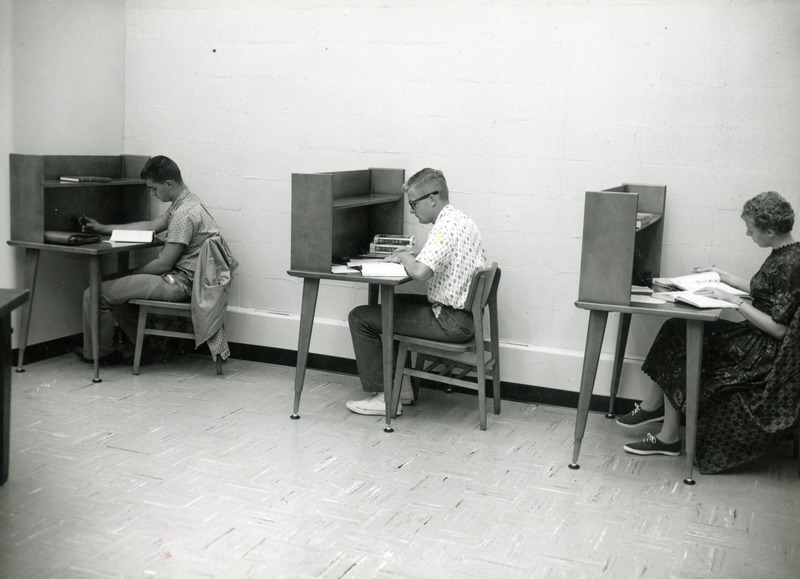 Students use three study carrels in the newly opened library 1st Addition.