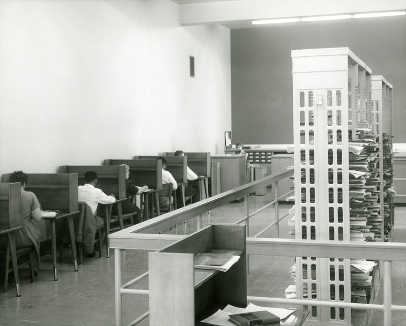 Students study in the Reserve Room (currently called Room 198), with attendant Ruth Vileta at the desk.