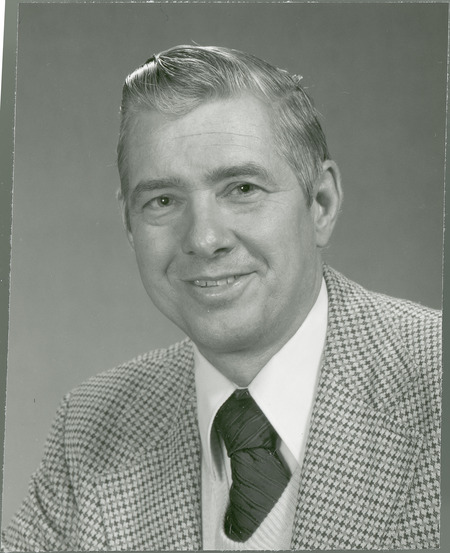 John Mahlstede, Associate Director of the Iowa Agriculture and Home Economics Experiment Station, is smiling in this portrait taken in 1978.