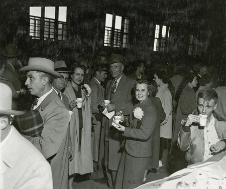 Alumni pose for a photo while enjoying refreshments and conversation at the Homecoming Alumni Luncheon in State Gym.