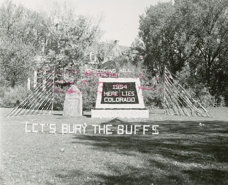 "Let's Bury the Buffs" is the theme of the Alumni Hall's display, a second place winner in the men's residences category. At the center of Homecoming Hill Cemetery is a grave marker that reads, "1954 Here lies Colorado." The grave stone to the left reads, "1953 Missouri passes on 13-7.".
