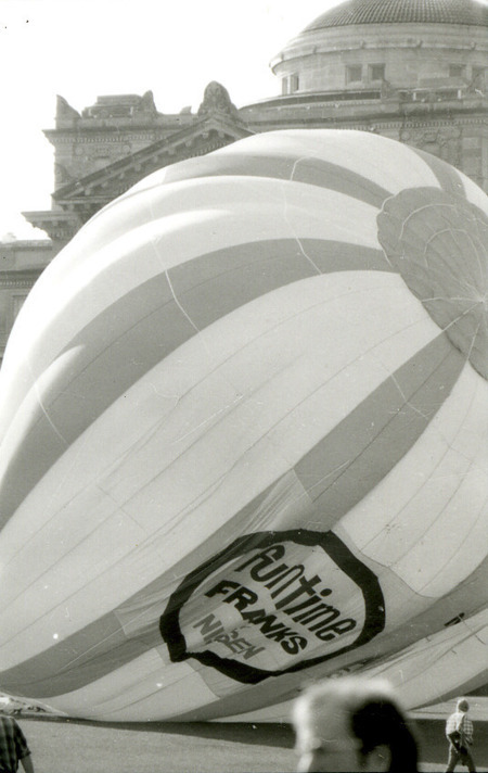 The Funtime Franks hot air balloon is inflated on Central Campus in front of Beardshear Hall for Homecoming, 1978.