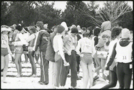 Runners gathering, either before or after the race, at the NCAA Women's cross-country meet Milwaukee, Wisconsin, on November 25, 1985, several hours before the plane crash. The main group in focus may be members of the Iowa State team.