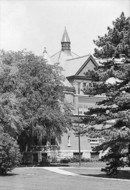 The southeast corner of Morrill Hall is visible between the trees.