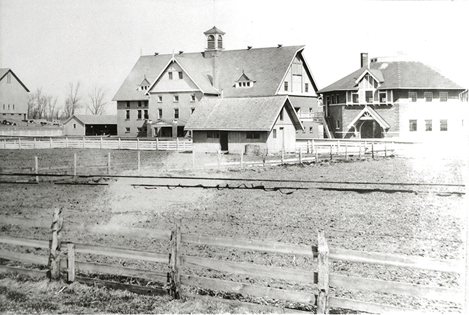 Photograph of the new Experiment Station Barn and the Judging Pavilion to the east. The view is looking northeast.