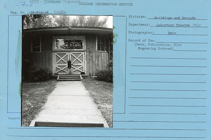 Photograph of the south doors of Shattuck Theatre. The doors are closed, and the sign above the doors says "Jane Eyre."