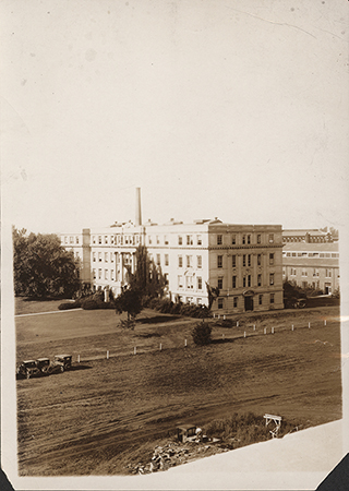 Photograph of the northeast corner of Marston Hall as seen from the library. Annotation: ''From top of Library.''