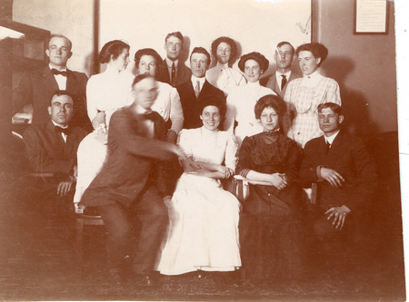 Students and faculty are posed for a photograph. Standing (left to right): Henry Eichling '11, Ruth Barrett Smith '12, Woman unknown, Man unknown, Man unknown, Carolyn Grimsby Guthrie '05, Woman unknown, W.H. Pew '07, Lillian Storms Coover '08, Sitting: Man unknown, A.H. Snyder (Soils Extension Faculty), Vera Dixon Dickson '08, Sophie Hargis Barker '08, G.T. Guthrie '08.