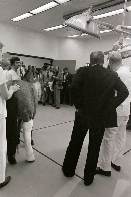 Photograph of President Gerald Ford's tour of Iowa State University College of Veterinary Medicine building