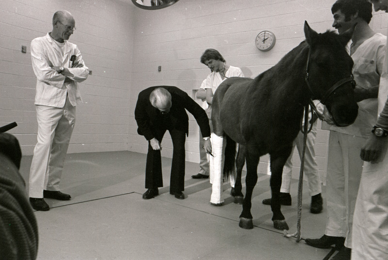 Photograph of President Gerald Ford's tour of Iowa State University College of Veterinary Medicine building
