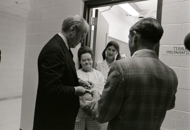 Photograph of President Gerald Ford's tour of Iowa State University College of Veterinary Medicine building