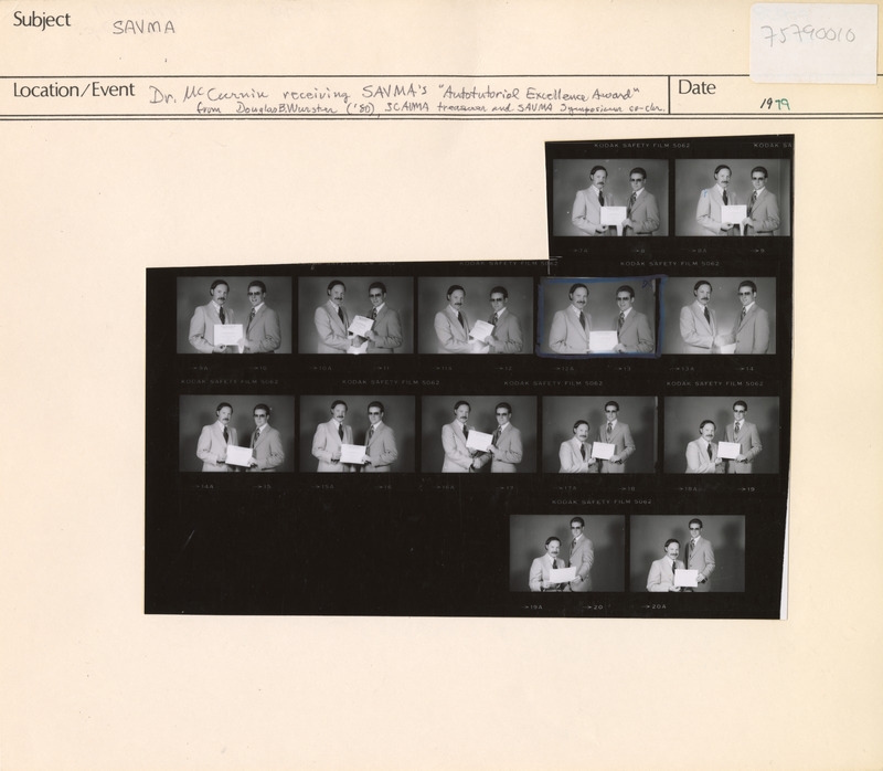 Annotation: "SAVMA. Dr. McCurnin receiving SAVMA's 'Autotutorial Excellence Award' from Douglas B. Wurster ('80), SCAVMA treasurer and SAVMA symposium co-chair"