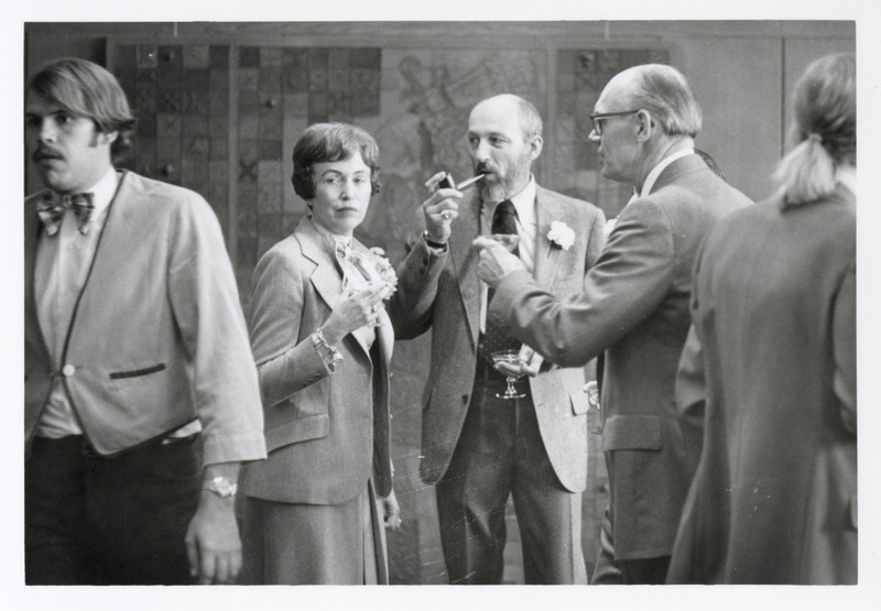 Photograph of Doris Salsbury, Marion Kitzman, and John Salsbury at a reception in the Memorial Union