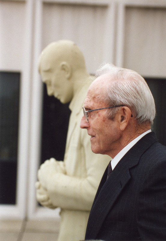 Photograph of Lawrence Forland by Gentle Doctor statue