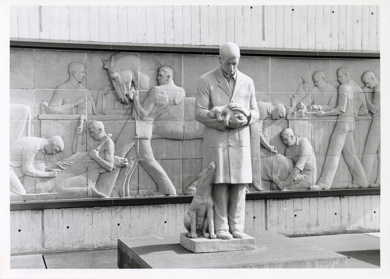 Photograph of the Gentle Doctor statue and the Veterinary Medicine mural at the College of Veterinary Medicine