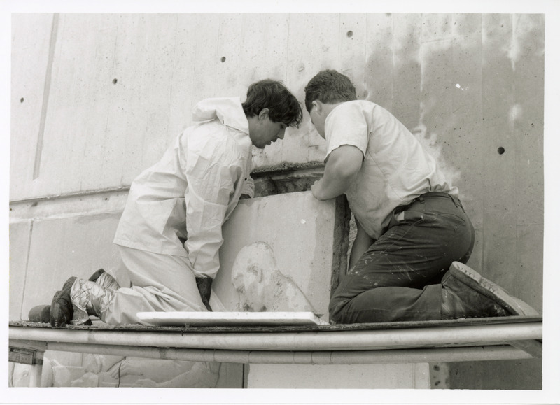 Photograph of the Veterinary Medicine mural being removed for restoration