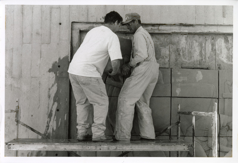 Photograph of the Veterinary Medicine mural being removed for restoration