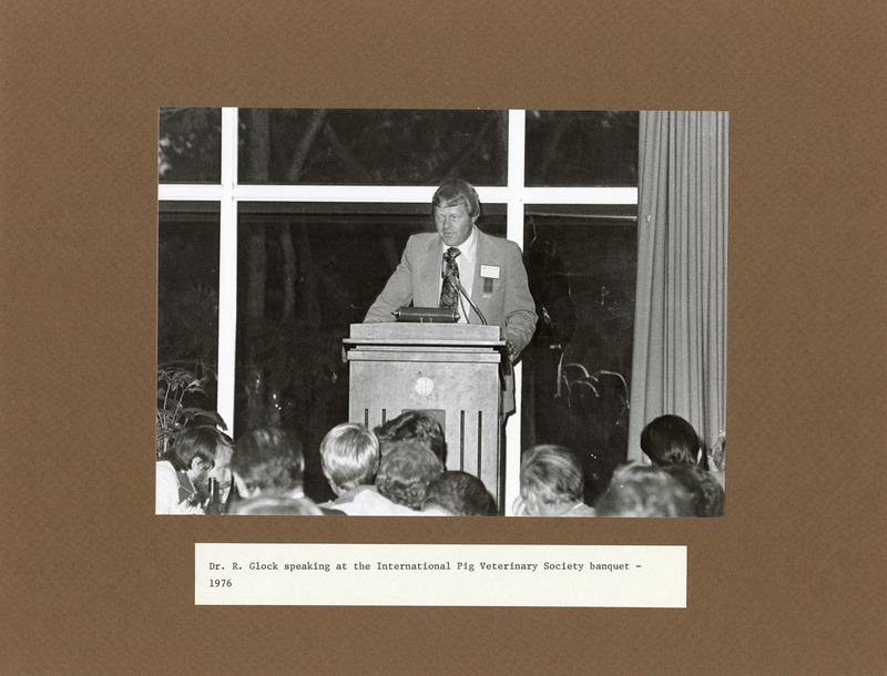 Annotation: "Dr. R. Glock speaking at the International Pig Veterinary Society banquet - 1976"