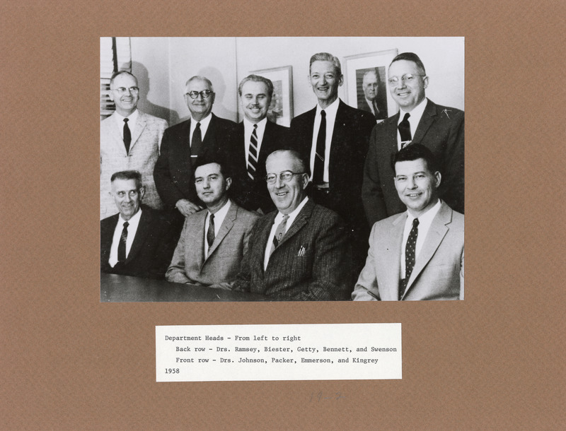 Annotation: "Department Heads - From left to right. Back row - Drs. Ramsey, Biester, Getty, Bennett, and Swenson. Front row - Drs. Johnson, Packer, Emmerson, and Kingrey. 1958"