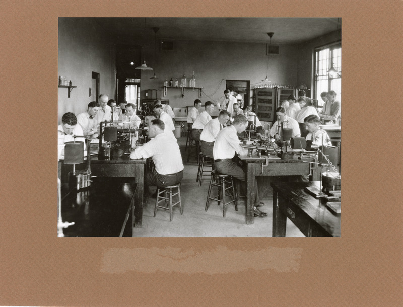 Photograph of Henry Bergman and Hugh Dukes instructing veterinary students in physiology