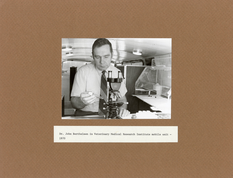 Annotation: "Dr. John Berthelsen in Veterinary Medical Research Institute mobile unit - 1970"