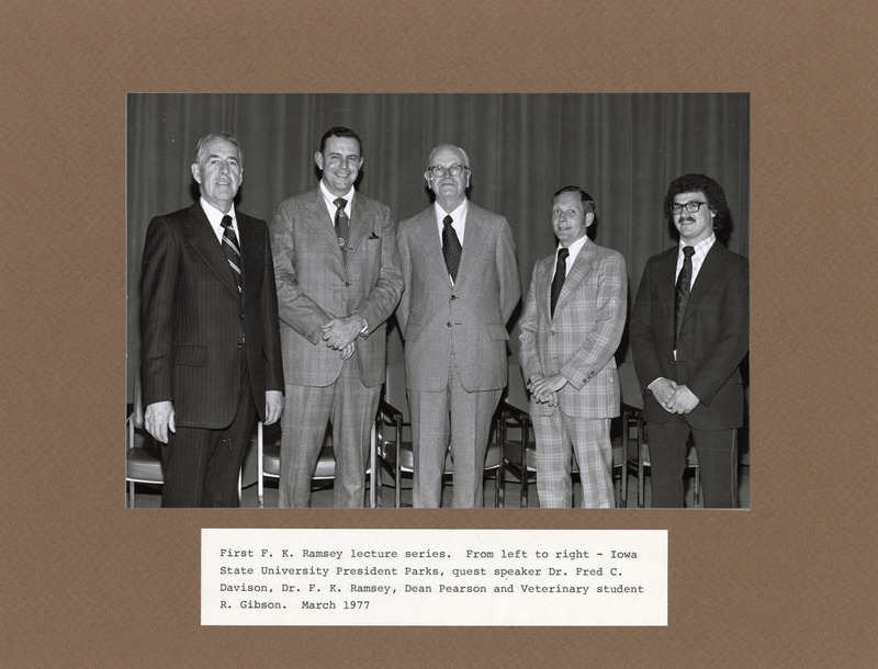 Left to right: Bob Parks, Fred Davison, Frank Ramsey, Phillip Pearson, Roger Gibson. Annotation: "First F. K. Ramsey lecture series. From left to right - Iowa State University President Parks, guest speaker Dr. Fred C. Davison, Dr. F. K. Ramsey, Dean Pearson and Veterinary student R. Gibson. March 1977"