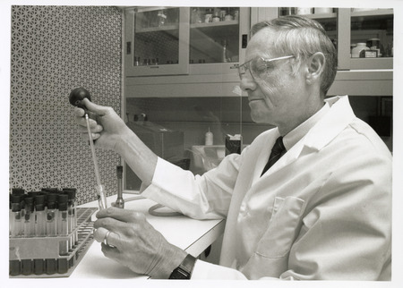Annotation: "Dean Richard F. Ross in Research Laboratory"
