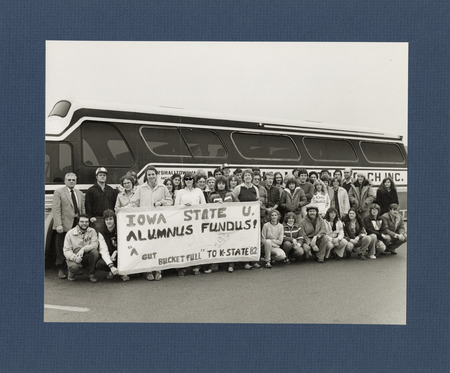 Photograph of veterinary students preparing to embark on a bus trip to Kansas State University