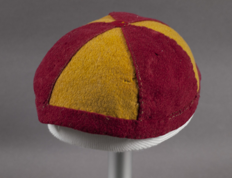 Beanie, or "Prep Cap," worn by male freshman students. The students were required to wear the caps until a moving up ceremony was held and the caps were all burned in a bonfire.