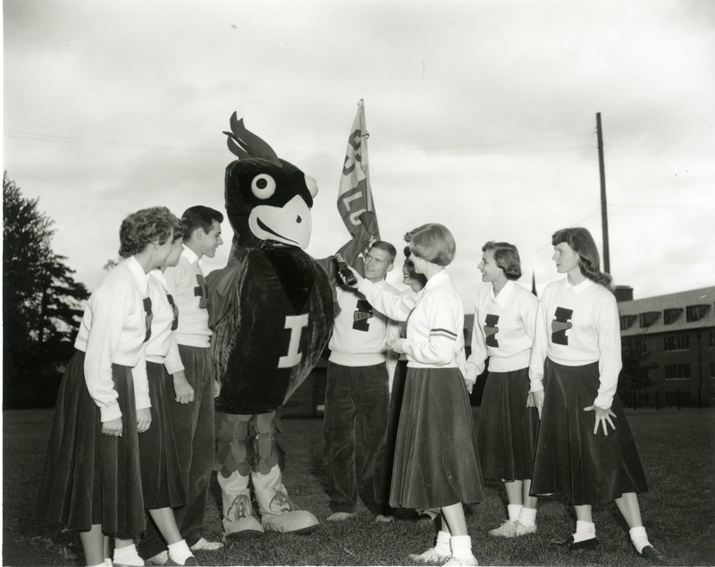 Photograph showing the Pep Council introducing Iowa State University new mascot, Cy the Cardinal.
