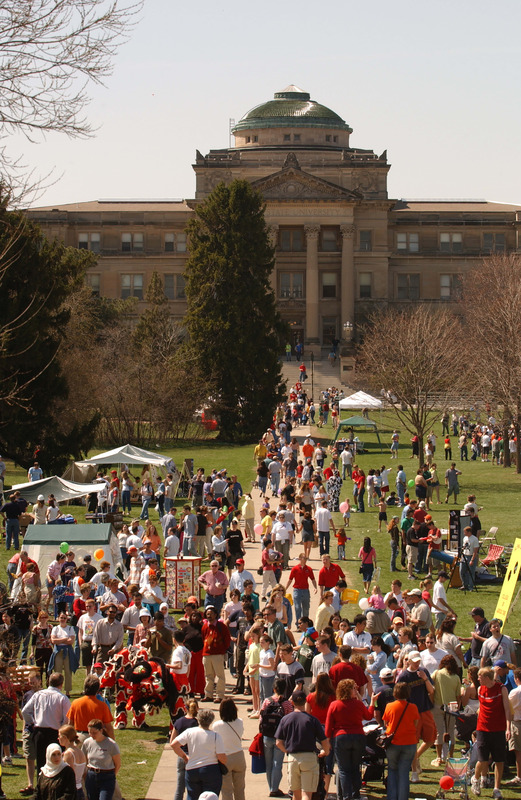 Photograph of central campus, with Beardshear Hall seen in the background during the Iowa State's annual VEISHEA celebration in 2003.