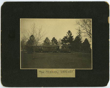 A photograph of the Dinkey steaming across campus.