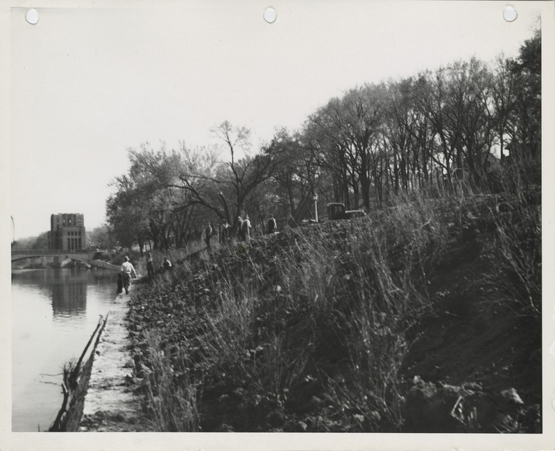 Photograph of people working on a levee in Iowa City