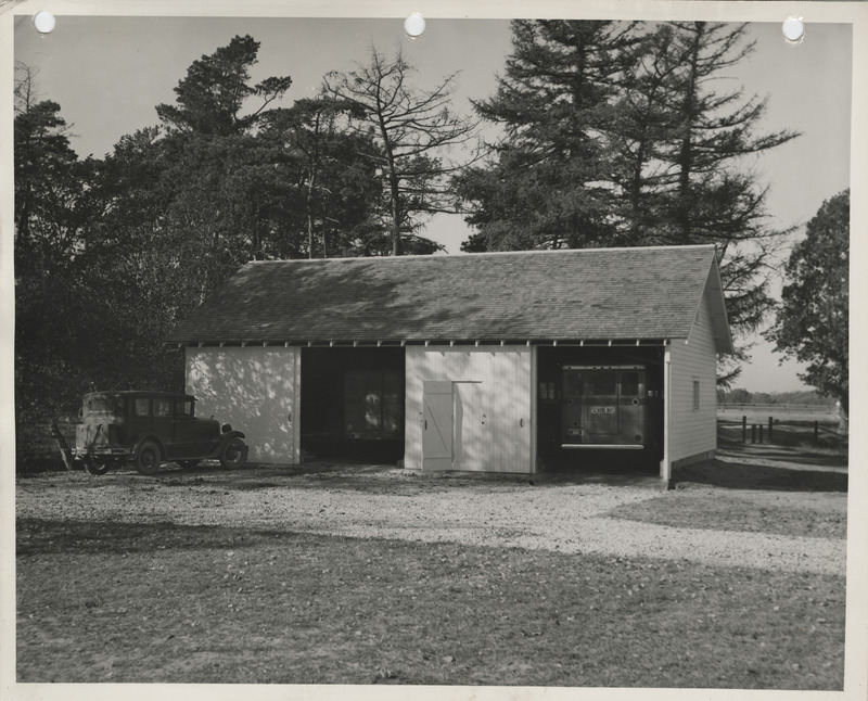 Photograph of a high school bus garage in Columbus Junction