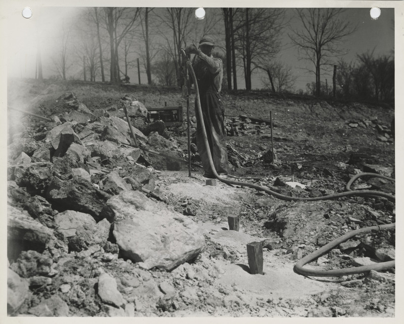 Photograph of a person working at a quarry near Columbus Junction